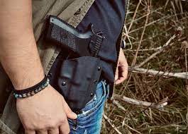 Why is it important to attend training programs for carrying holsters?